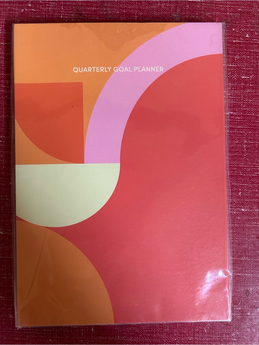 Quarterly Goal Planner - Red and Pink Abstract Cover